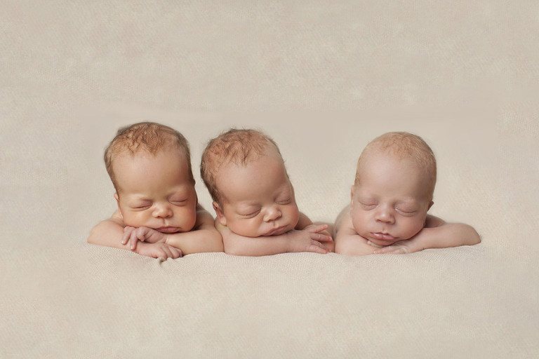 Newborn Triplet photos on blanket in Tampa
