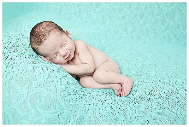 Teal background for Jace newborn photos