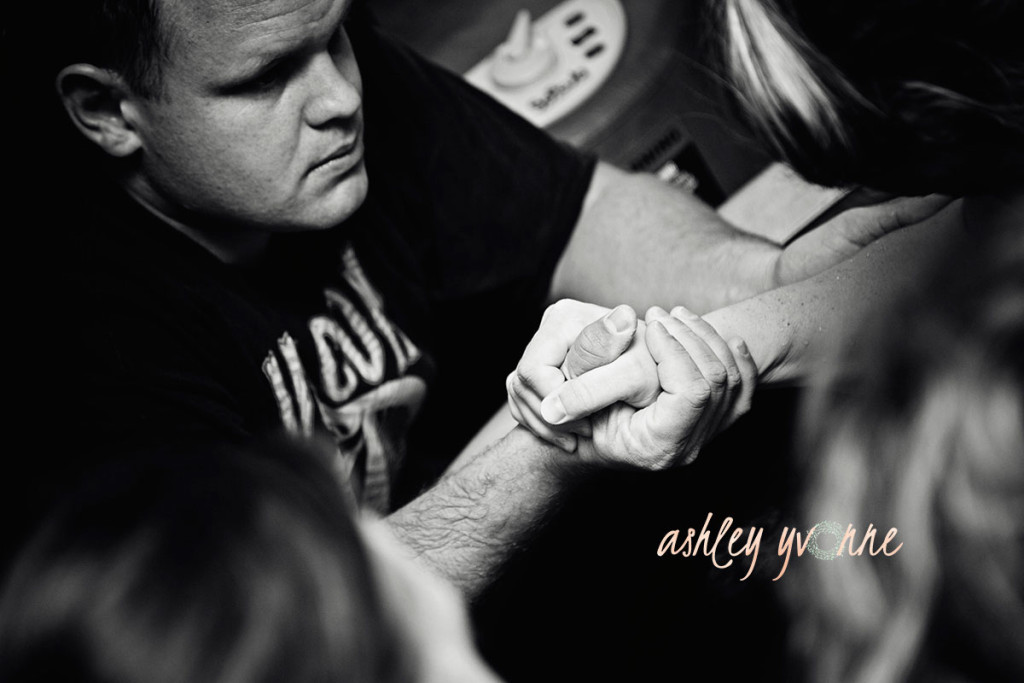 Parents holding hands black and white
