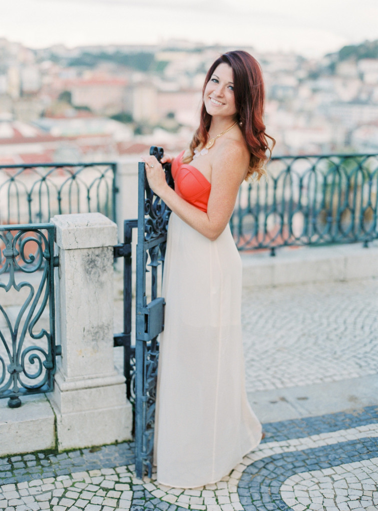 woman standing next to gate
