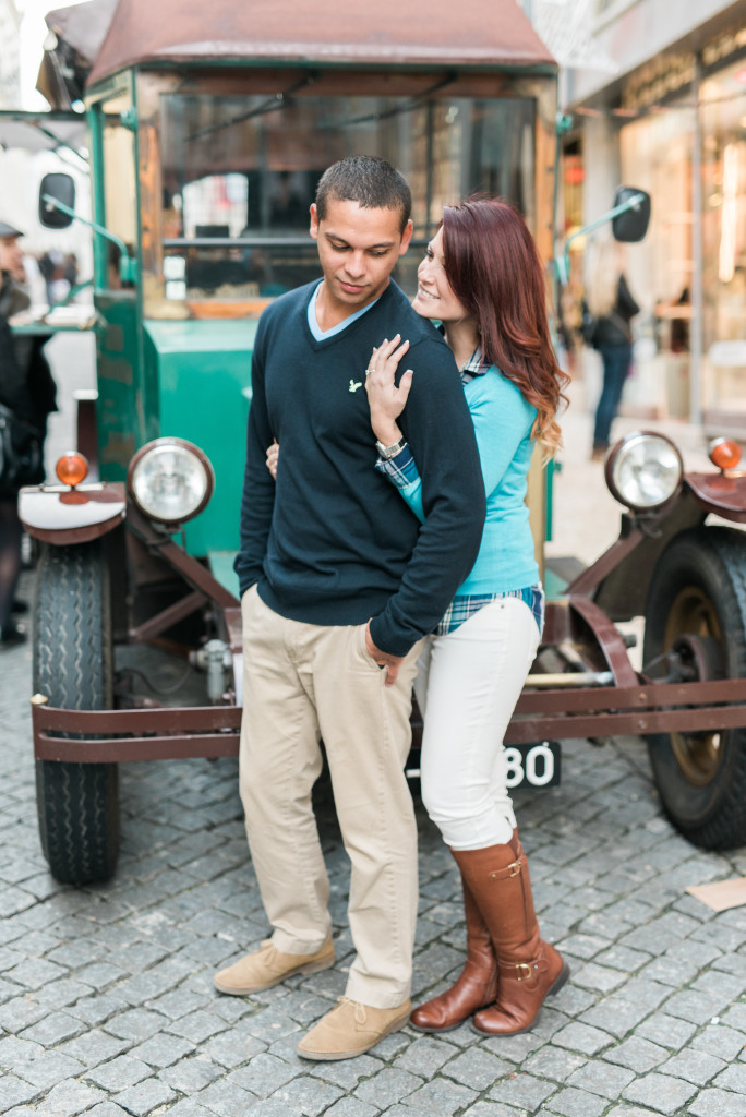 couple in front of old car