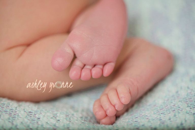 close up of newborn feet