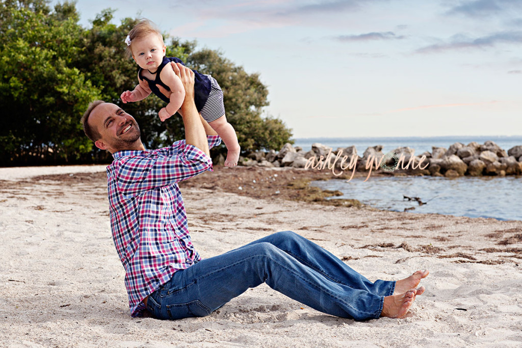 dad putting girl in air