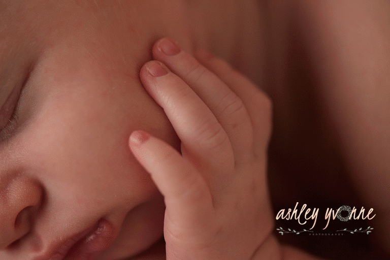 details of little newborn hands